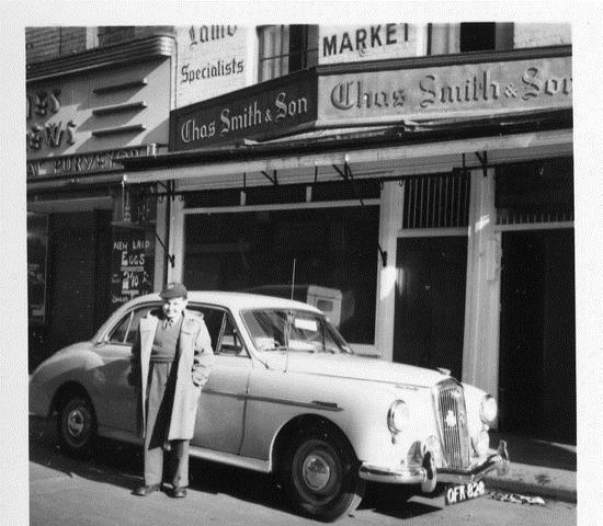 A Sunday morning the 1950s, and Charles Smith poses outside his father’s Butchers Shop at no 39 The Shambles