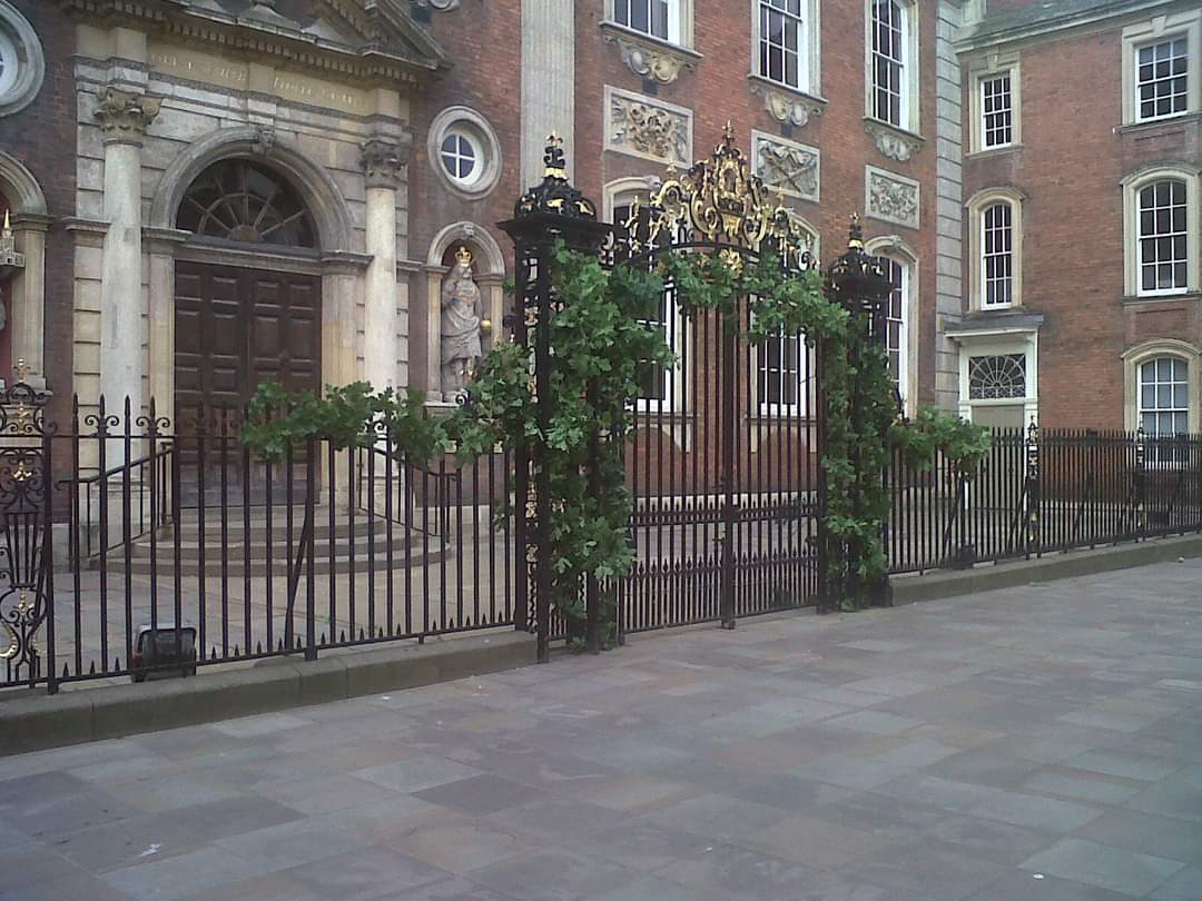 The gates at the Guildhall framed by oak leaves in celebration of Oak Apple Day