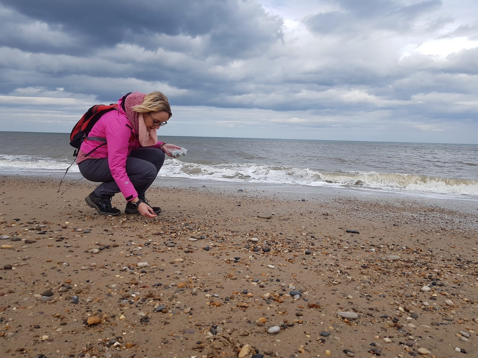 Collecting glass from the beach at Seaham in the north east of England.