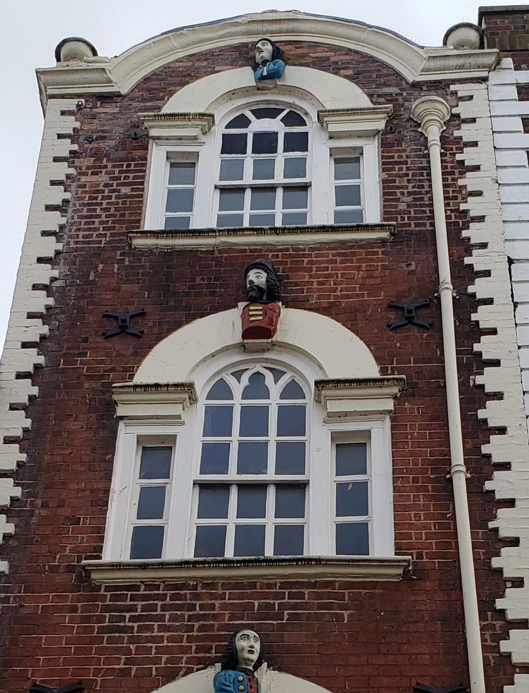 Three heads are better than one. On which building?