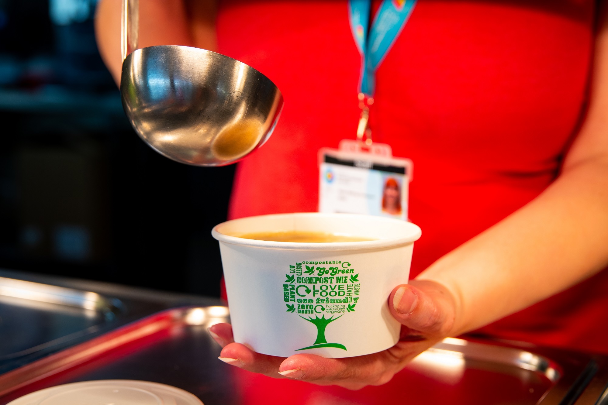 Soup is served in a biodegradable bowl